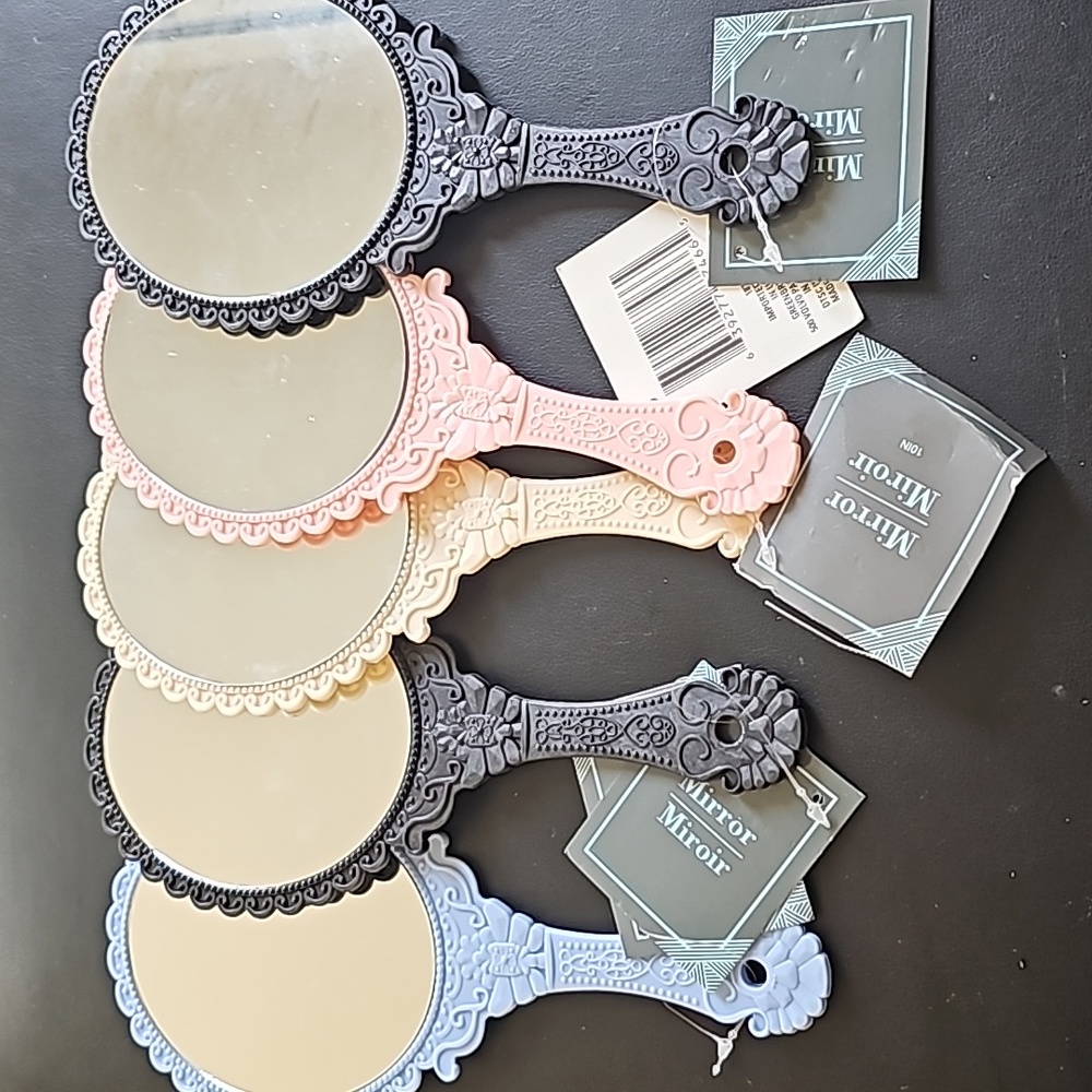 Hand held mirrors